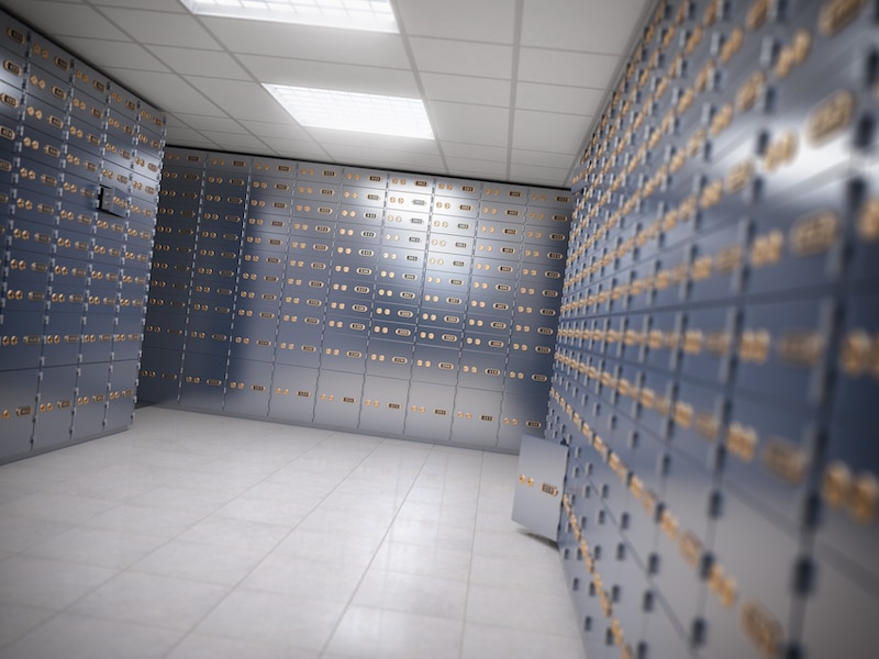 Safe deposit boxes room inside of a bank vault. Safe Deposit Box Inside Bank | Source: Depositphotos